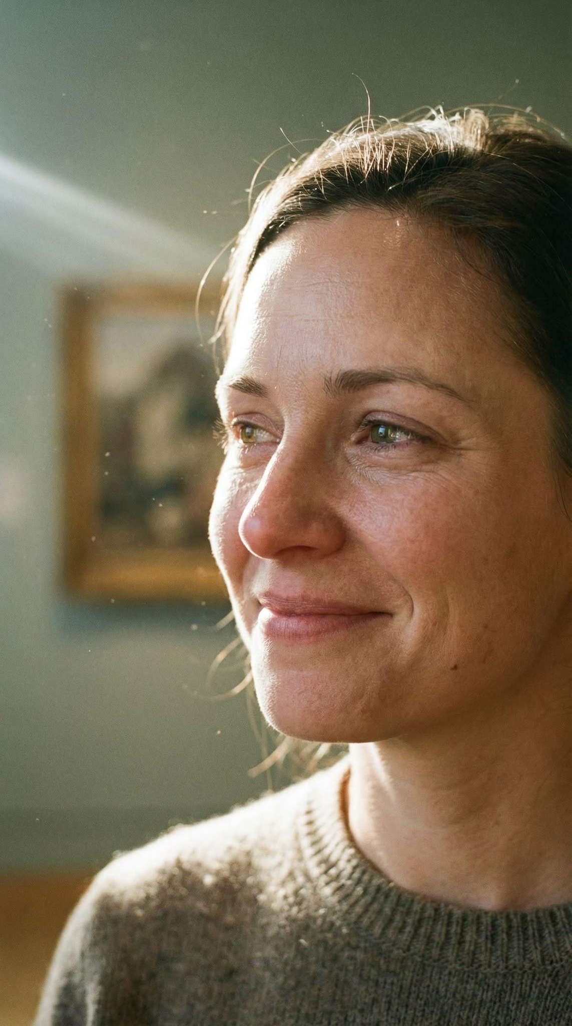Woman smiling in warm side light